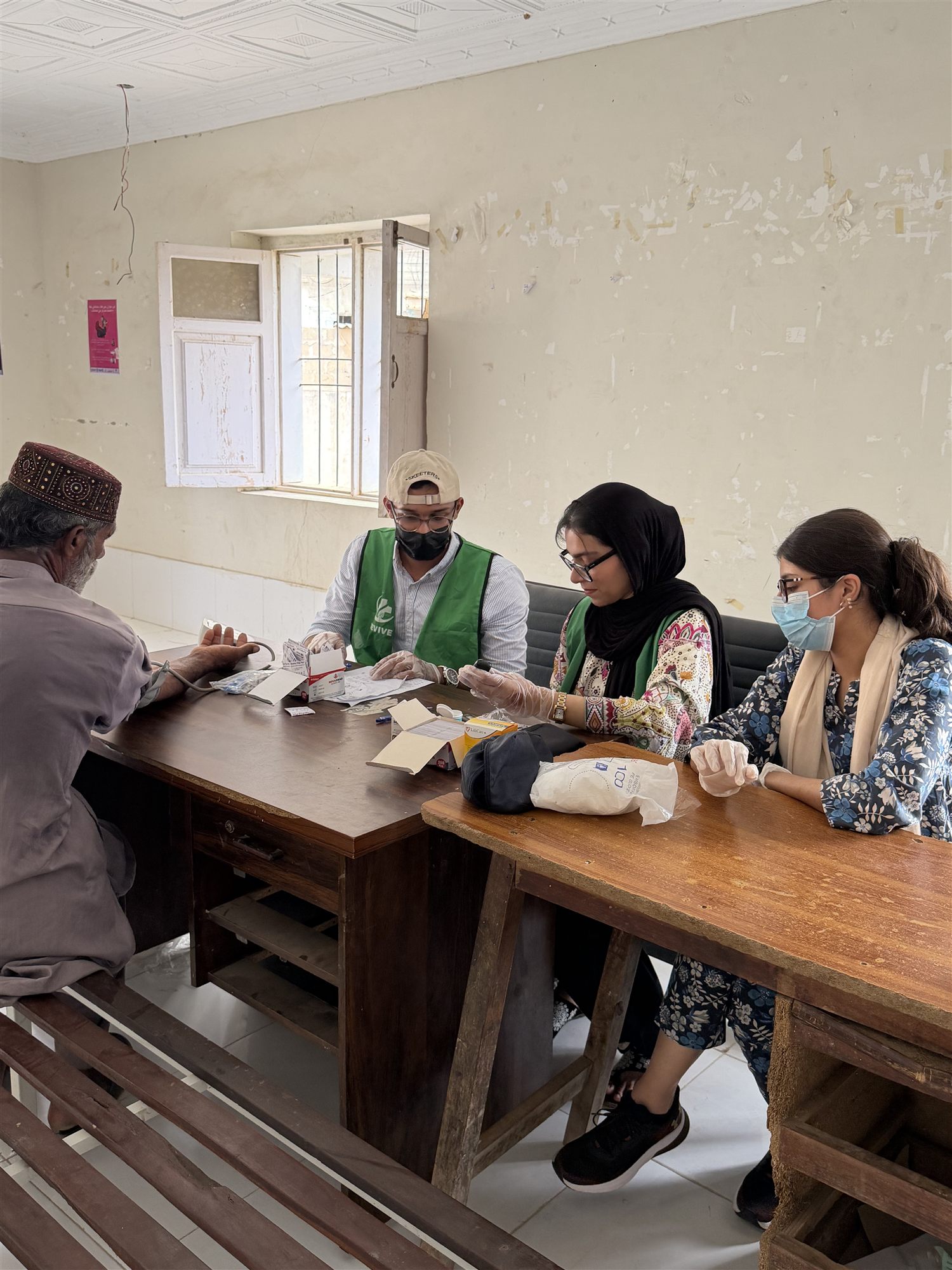 Patient registration and consultation at a Revive medical camp