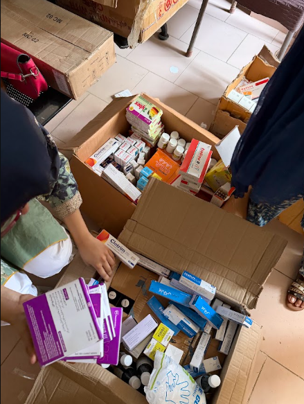 Sorting donated medicines at Revive Pharmacy